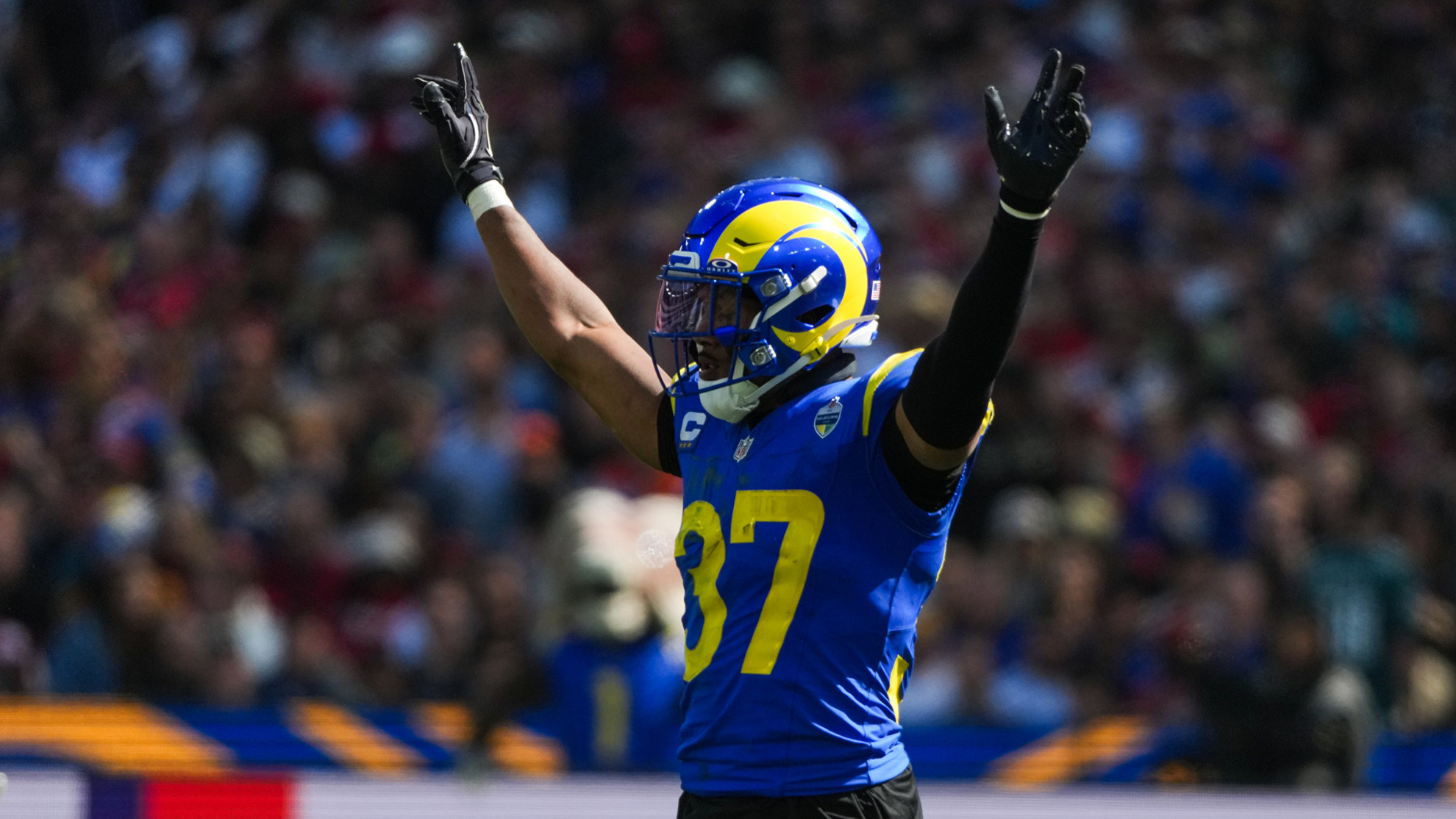 Los Angeles Rams safety Quentin Lake celebrates a play during a game versus the San Francisco 49ers in Australia