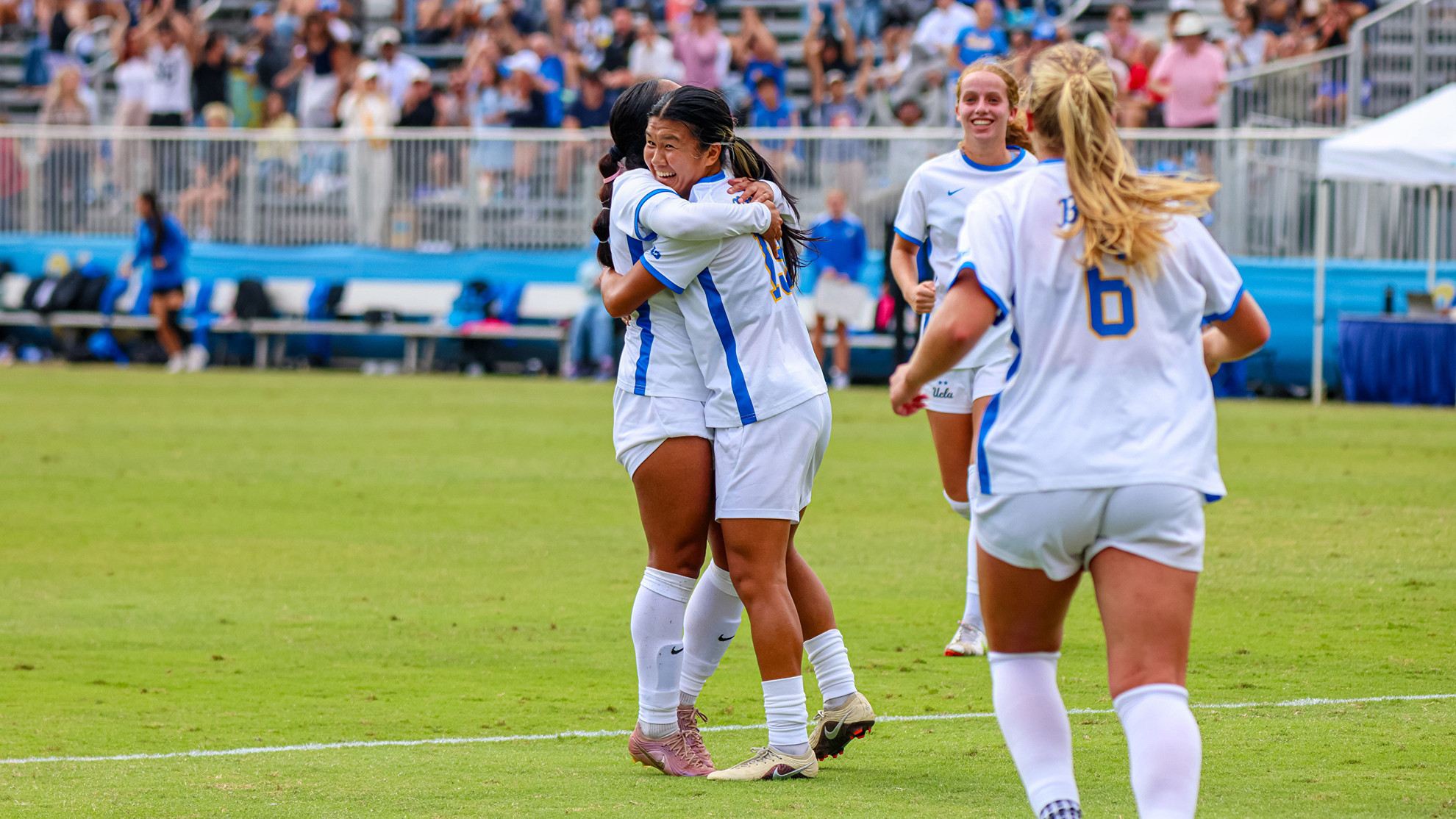 Oruha Hayashi celebrates after her first goal of the game against Illinois