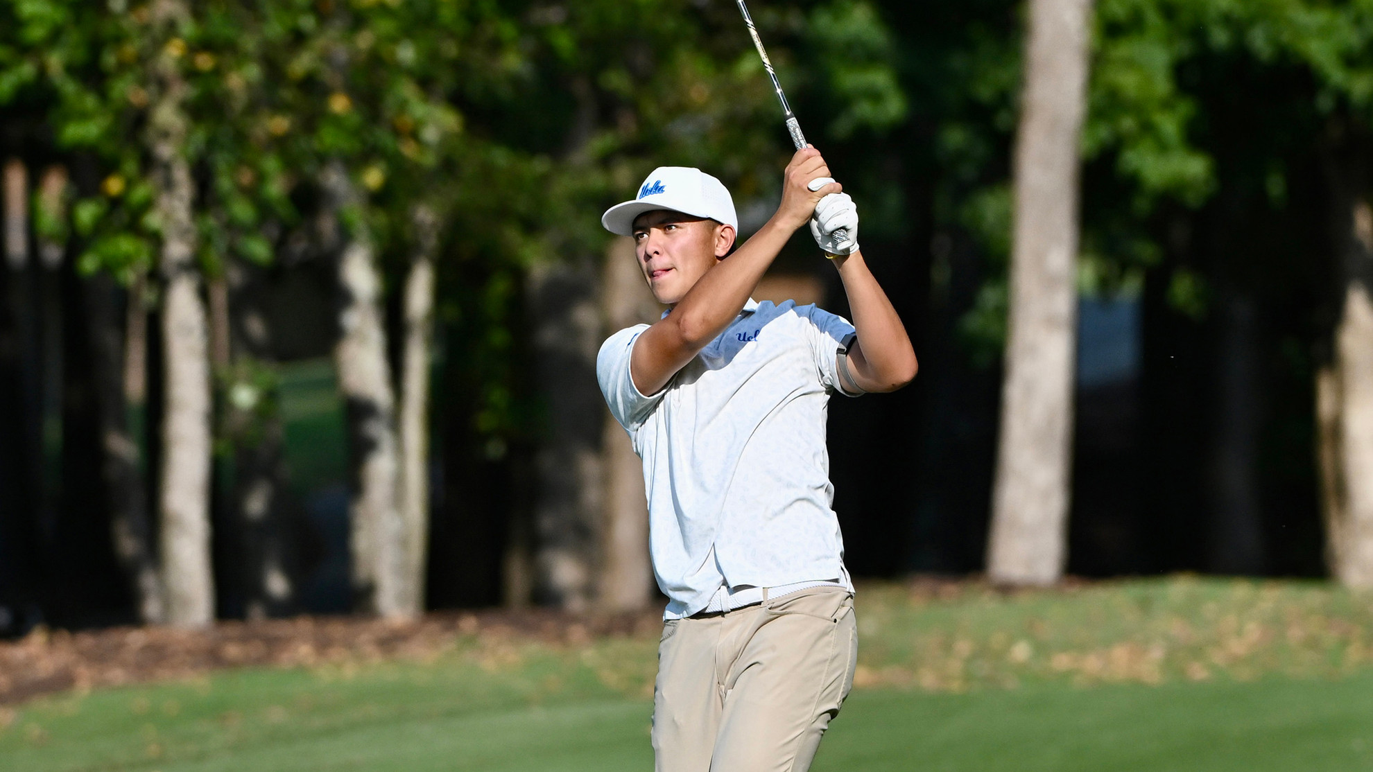 Tyler Loree hits a shot on the fairway in Georgia