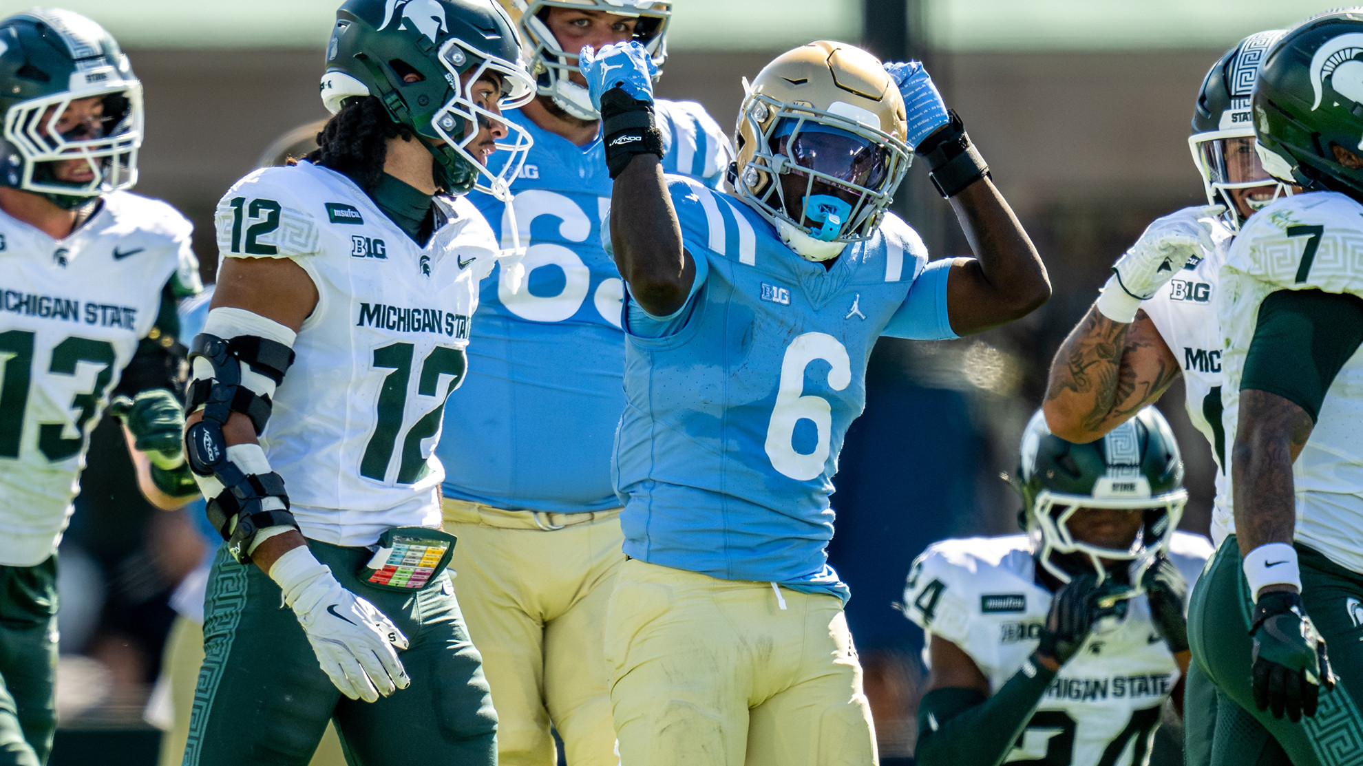 Anthony Woods celebrates a first down