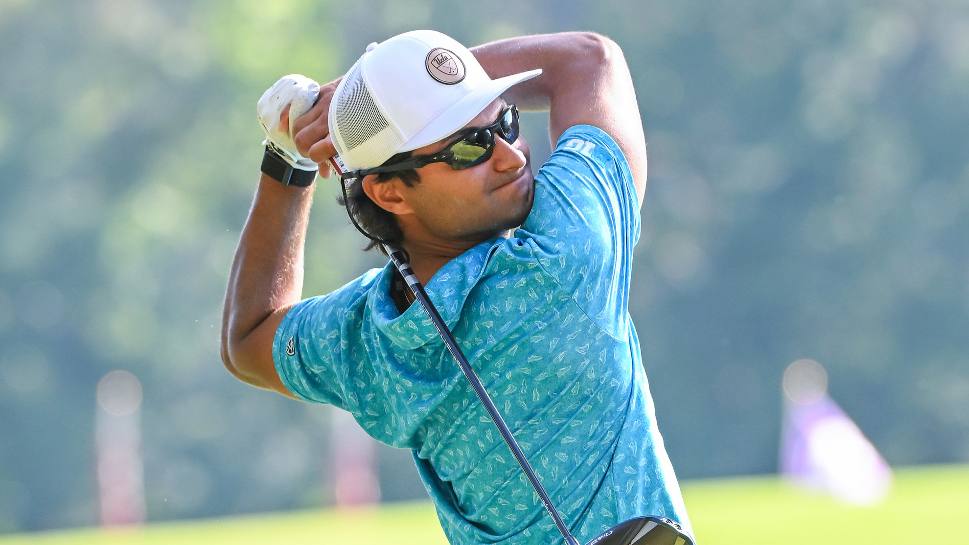 Alex Papayoanou drives the ball on the course at The Golf Club of Georgia