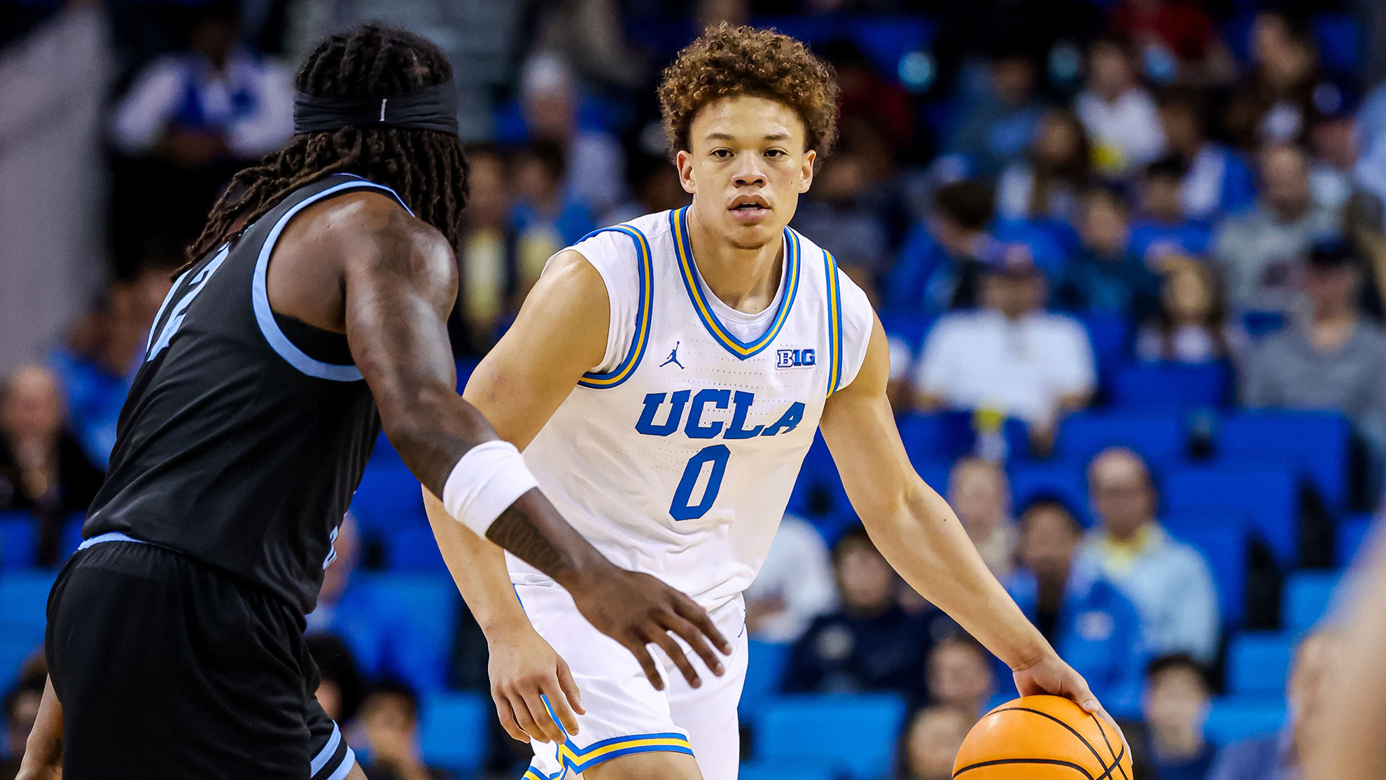 Trent Perry studies the floor in the first half of UCLA's game against USD