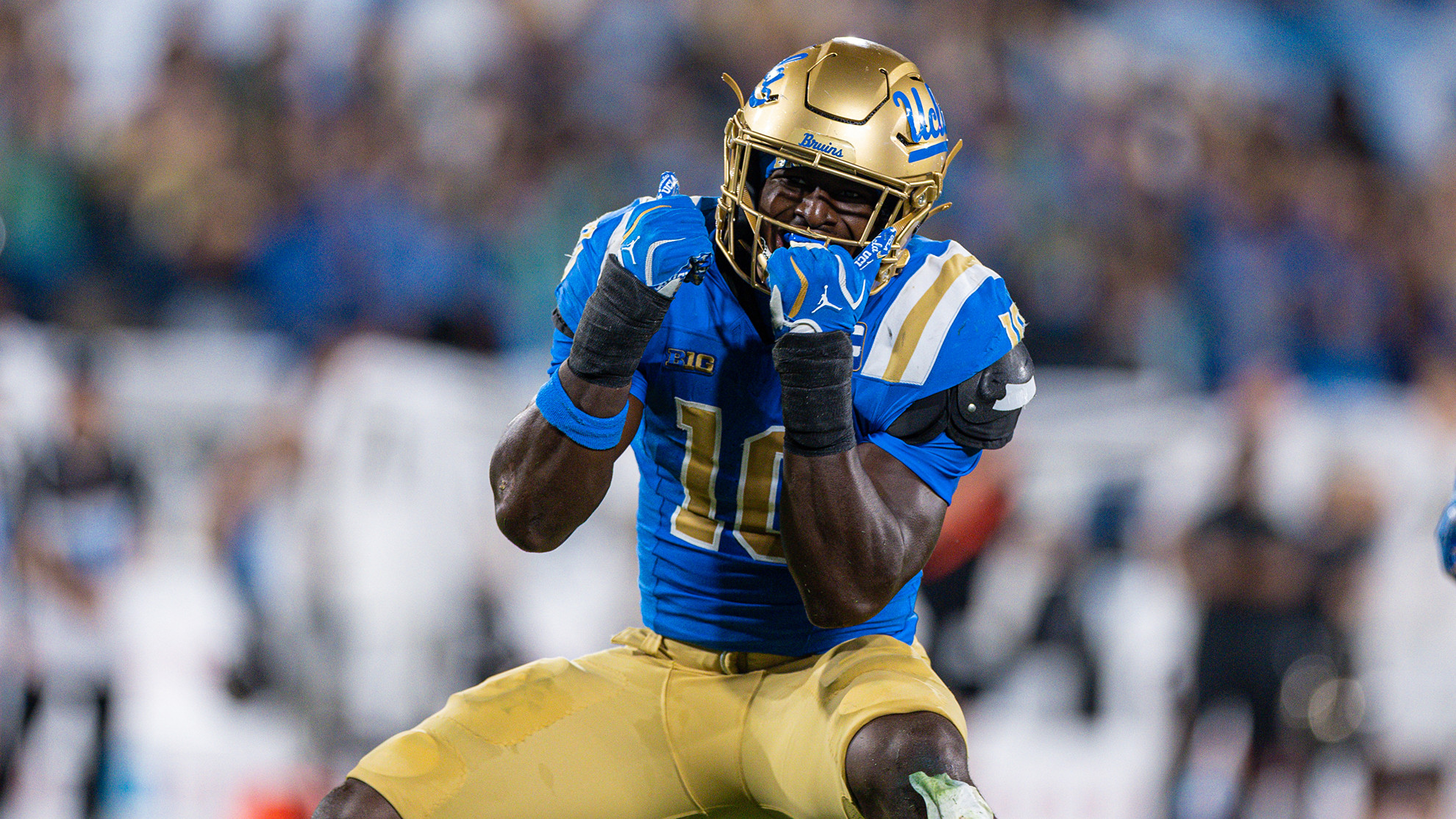 Sammy Omosigho celebrates a play