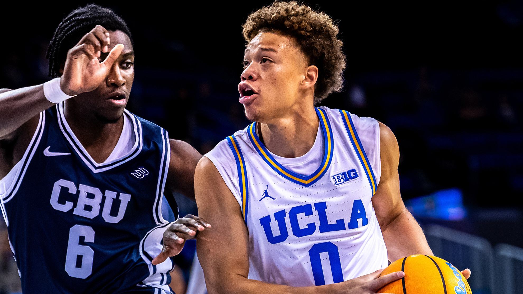 Trent Perry drives to the basket during a game against California Baptist