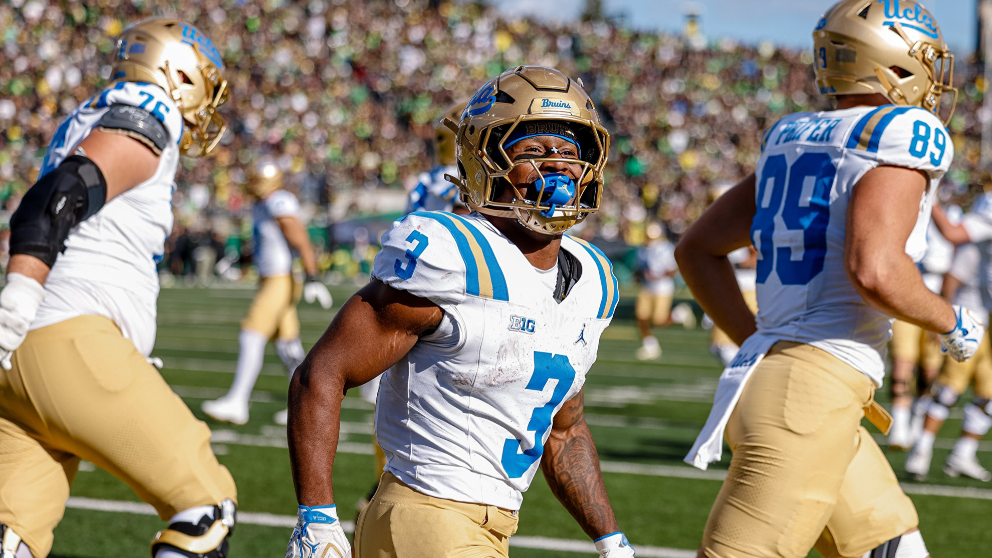 Wayne Knight grins towards the camera after scoring his second touchdown at Oregon
